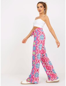 Fashionhunters Ροζ φαρδύ παντελόνι από ύφασμα με σχέδια