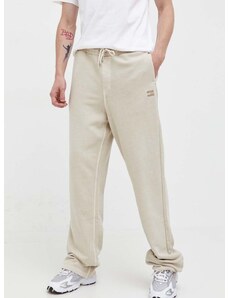Βαμβακερό παντελόνι Tommy Jeans χρώμα: μπεζ