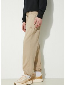 Βαμβακερό παντελόνι New Balance χρώμα: μπεζ