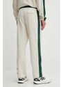 Βαμβακερό παντελόνι New Balance χρώμα: μπεζ, MP41504LIN
